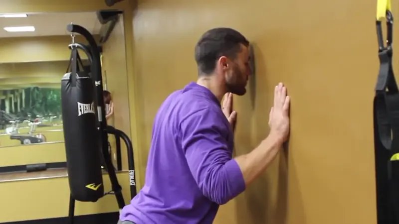 Wall Push-Up - do 3 sets of 10 wall push-ups
