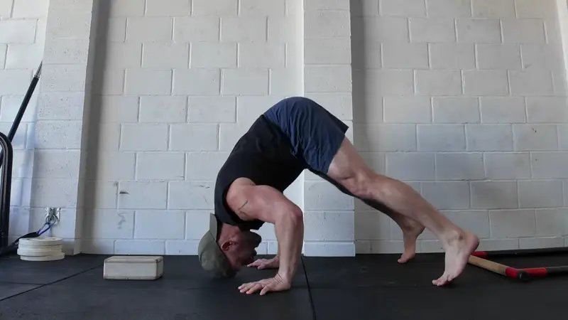 Pike Push-Up - do 3 sets of 10 pike push-ups