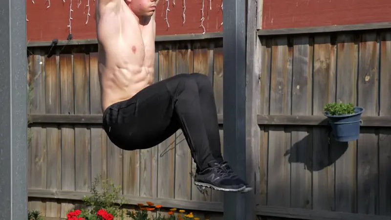 Hanging Knee Raise - do 3 sets of 10 hanging knee raises