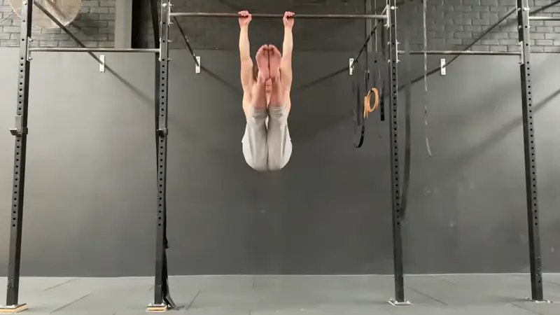Toes to Bar - do 3 sets of 10 toes-to-bar hanging leg raises