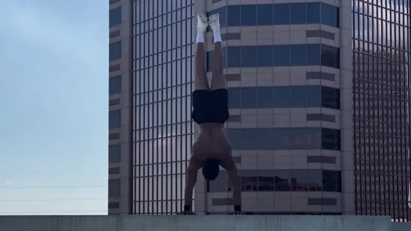 do 3 sets of 3 freestanding handstand push-ups