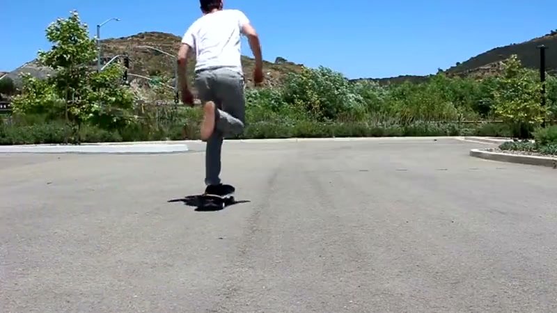 Pushing - confidently push on a skateboard to generate forward momentum and speed