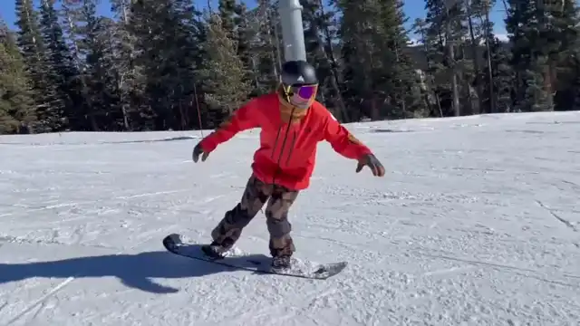 press the nose of the board while riding