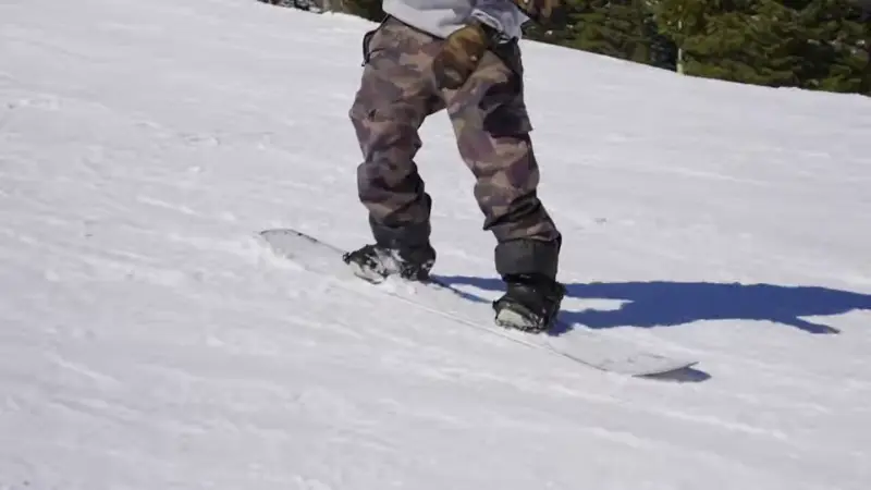 press the tail of the board while riding