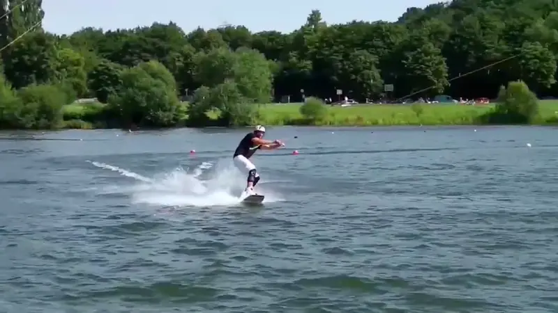 ollie a frontside 180 on flat water